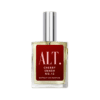 A bottle of perfume on a green background.