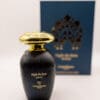 Elegant perfume bottle with gold cap.